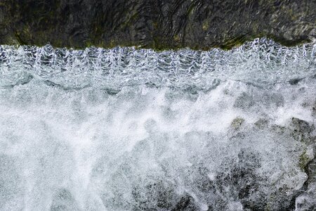 Fluent running water natural stream photo