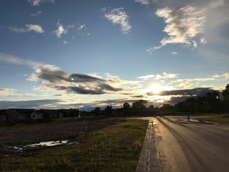 Sun set sky puddle