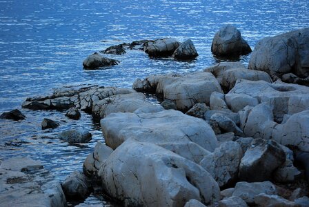 Romantic croatian coast stones photo