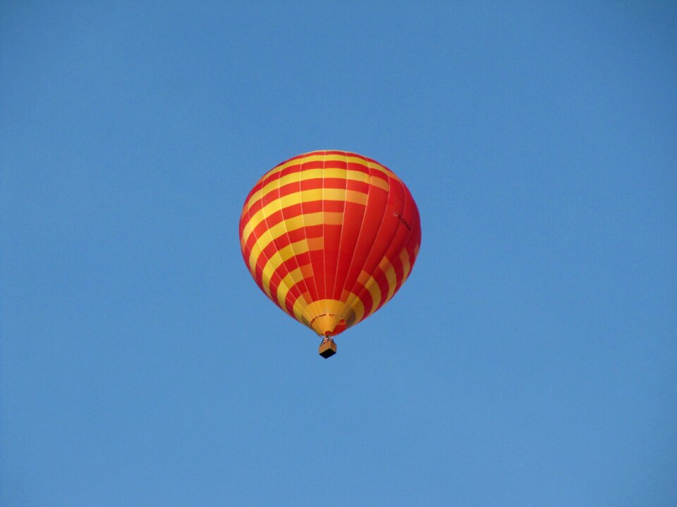Hot air balloon partly cloudy sky
