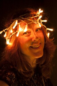 Christmas light chain woman photo