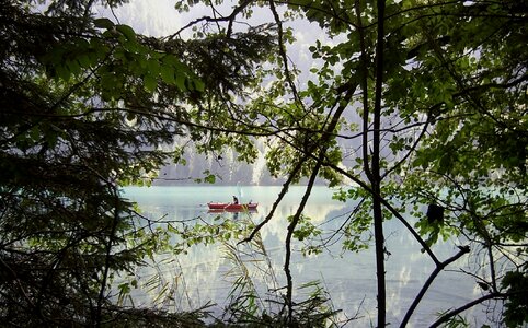 Fisherman canoe water photo