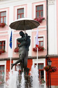 Statue red house umbrella