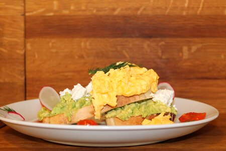 Scrambled eggs avocado sandwich photo