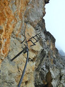 Dolomites rock wall abyss photo