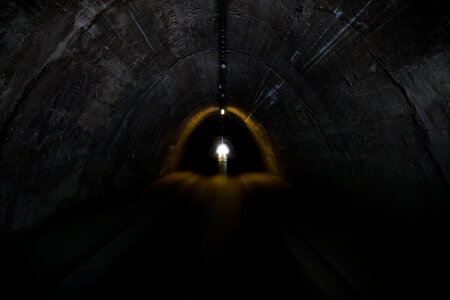 The darkness way tunnel of light photo