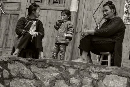 Group portrait the old woman kids