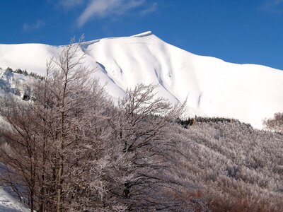 Snow-capped peaks corno alle scale italy photo