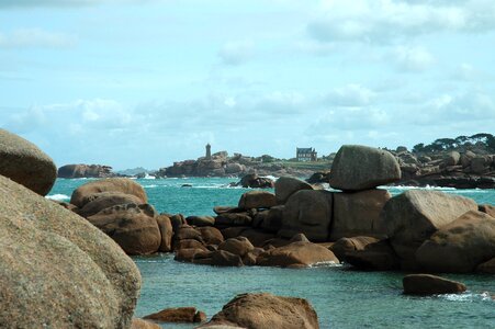 Rock rocky coast lighthouse photo