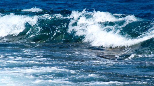 Sea water spitting water photo