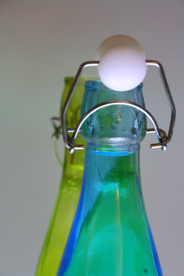 Two empty bottles snap closure beverages