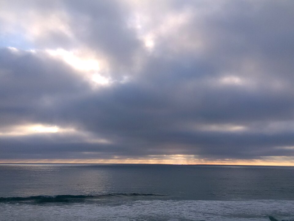 Sunset beach storm photo