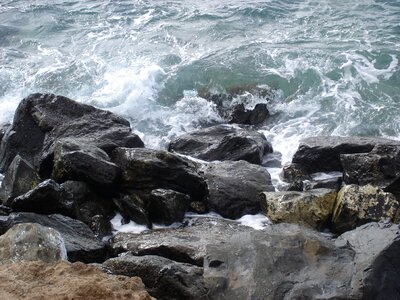 Rock by the sea rocky coast photo