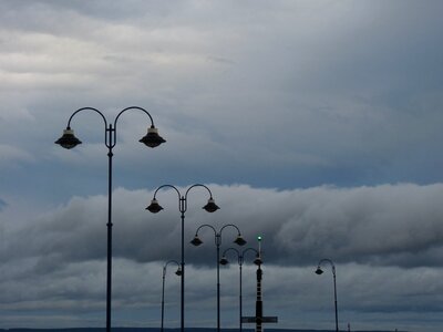 Cloudy lamp post égkép photo