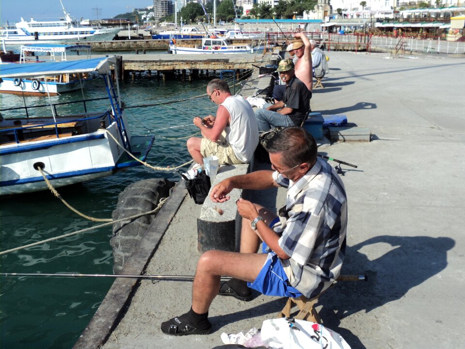 Quay city resort fishermen