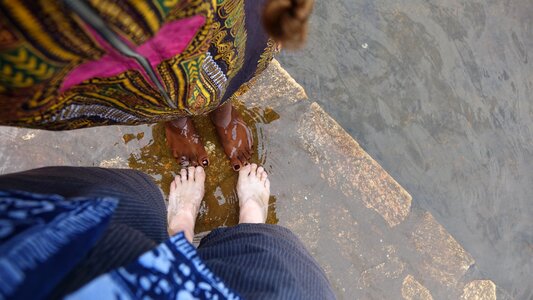 Feet in the river nile the source of the river nile lake victoria photo