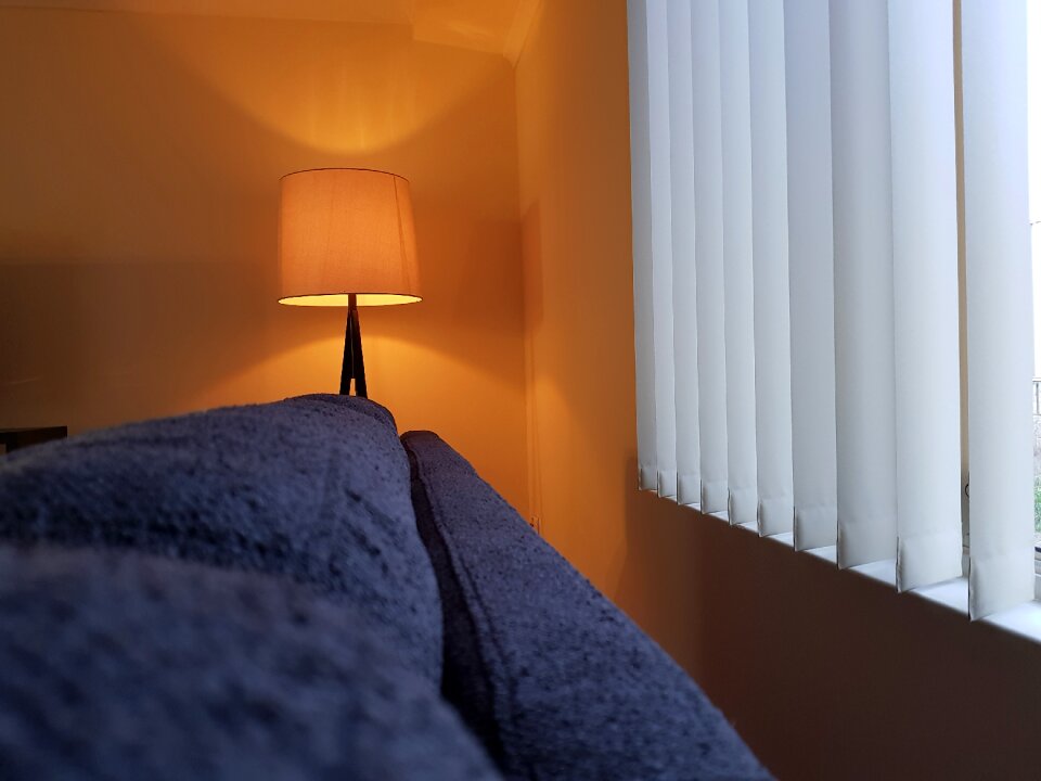Blue couch blue lamp