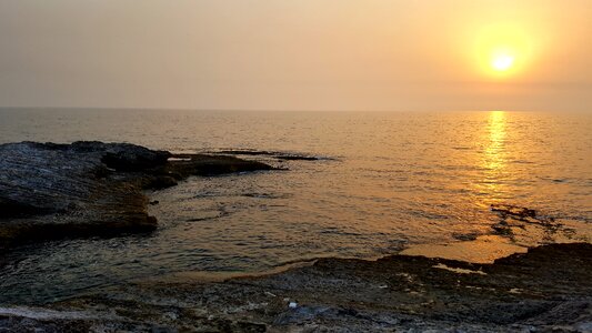 Water sunset seashore photo
