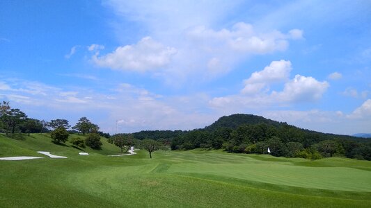 Golf course field sky photo
