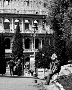 Colosseum street photography street performer