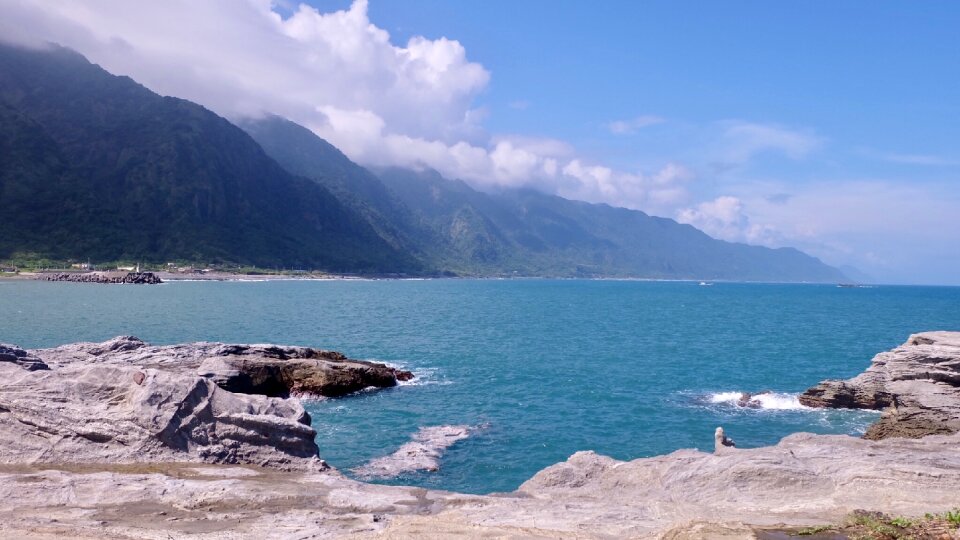 Reef mountains blue sky and white clouds photo