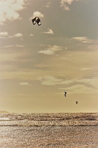 Kiteboarding flying photo