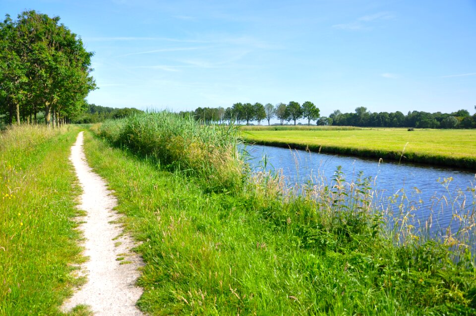 Dirt track waterway canal photo