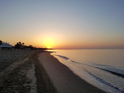 Sun sand horizon photo