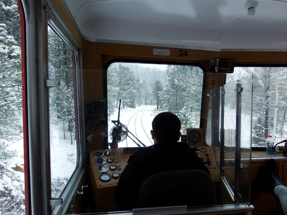 Snow cog railroad conductor