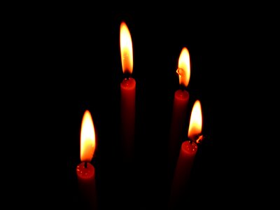 Dark candlelight glowing photo