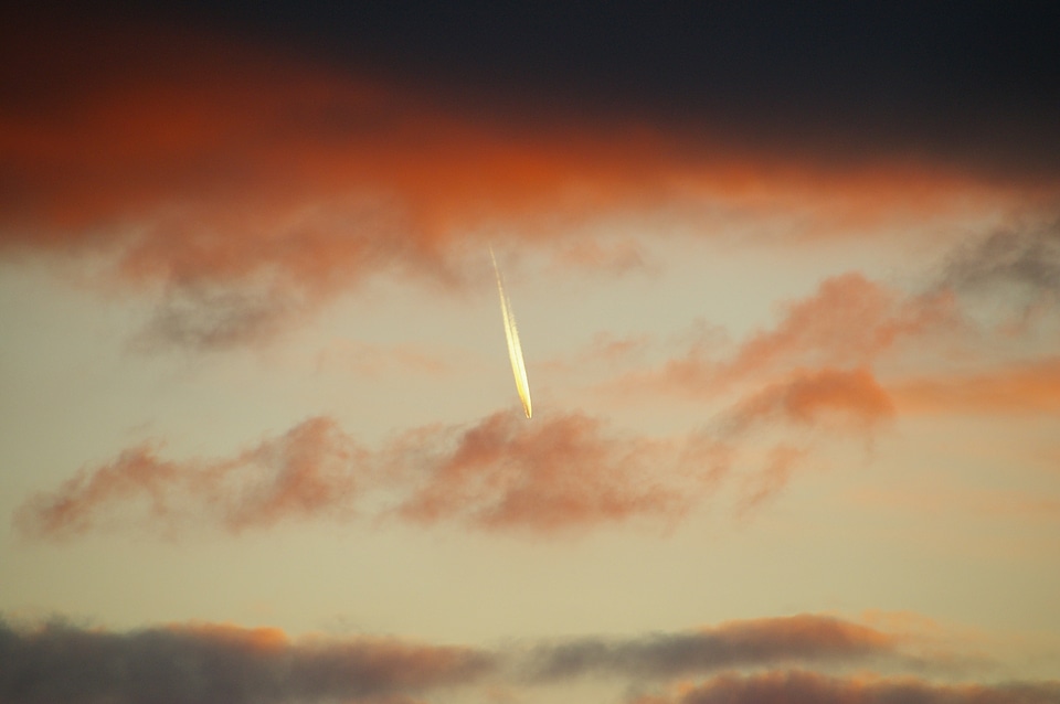 Contrail sunset clouds