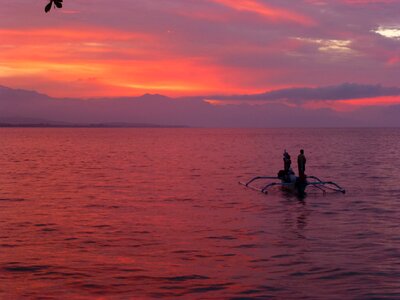 Indonesia sunset sea boat photo