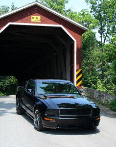 Muscle car covered bridge automobile photo