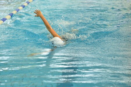 Breaststroke swimming water in hand competition