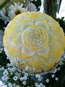 Floral fruit carving yellow flower