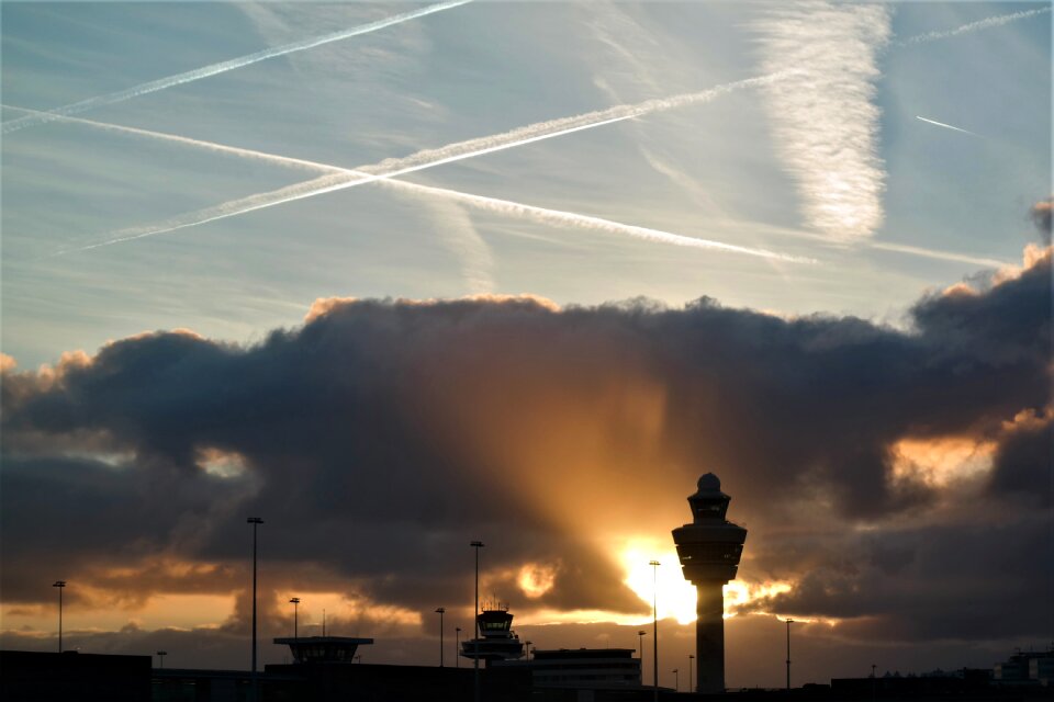 Silhouette tower contrail