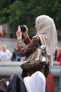 Woman sightseeing camera