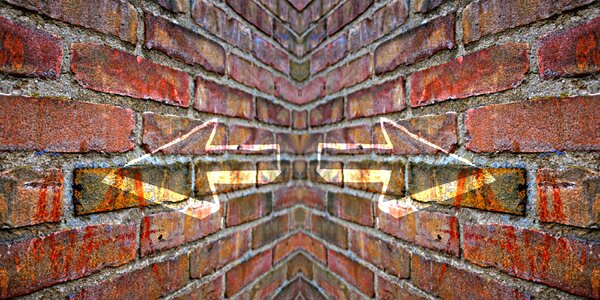 Red brick wall arrow direction photo