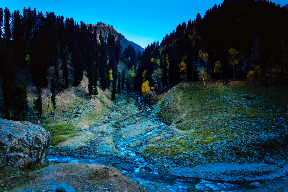 Autumn river through the mountains stream flowing