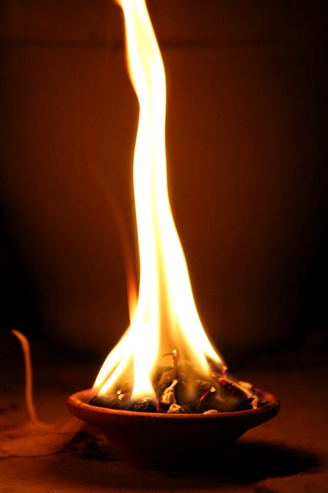 Ignite fire burning diya photo