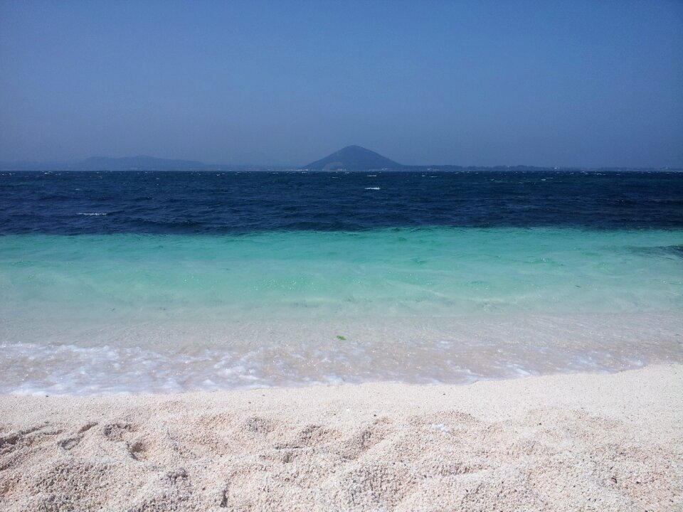 White sandy beach sea jeju island