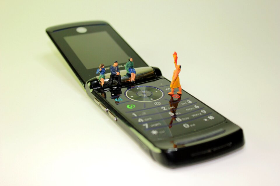 Viewers sitting flip phone