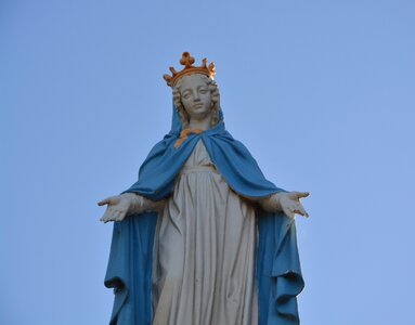 Blue sky religious figure virgin mary photo