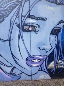 Street art berlin mourning blue face