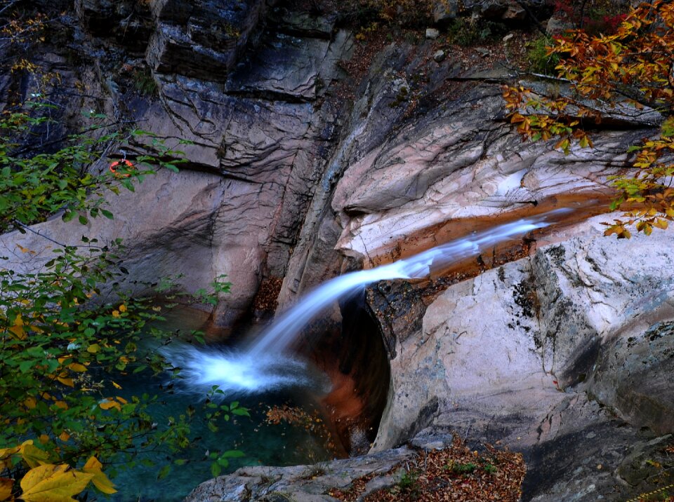 Mini waterfall autumn valley
