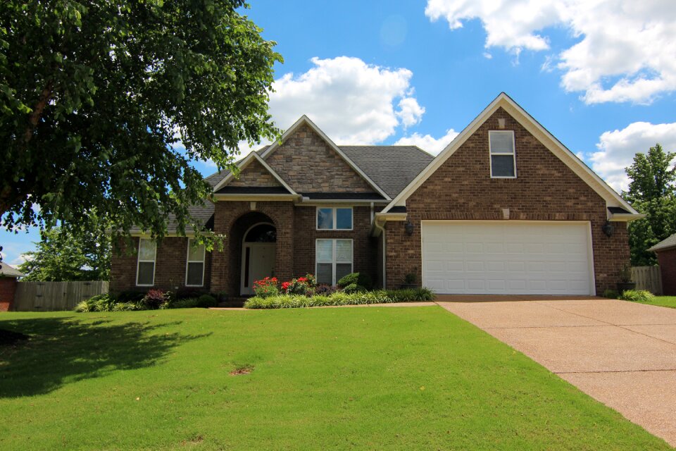 House on a hill brick home with 2 car garage
