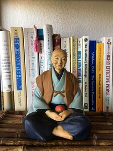 Meditation on bookshelf photo