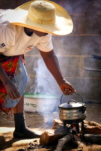 Woman cook cooking pot photo