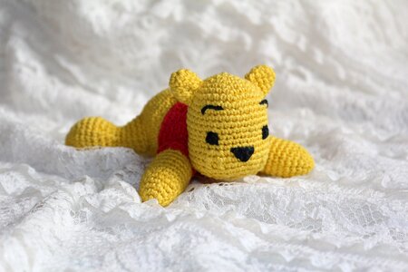 Knitted toy teddy-bear childhood