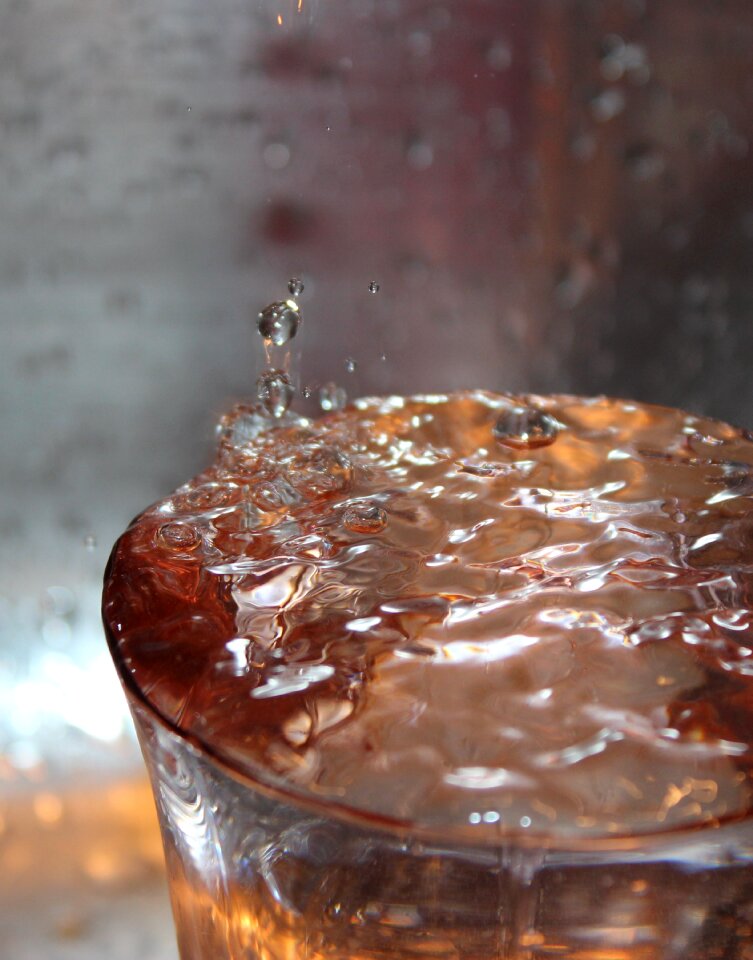 Drop of water drip close up
